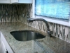 Vertical glass backsplash